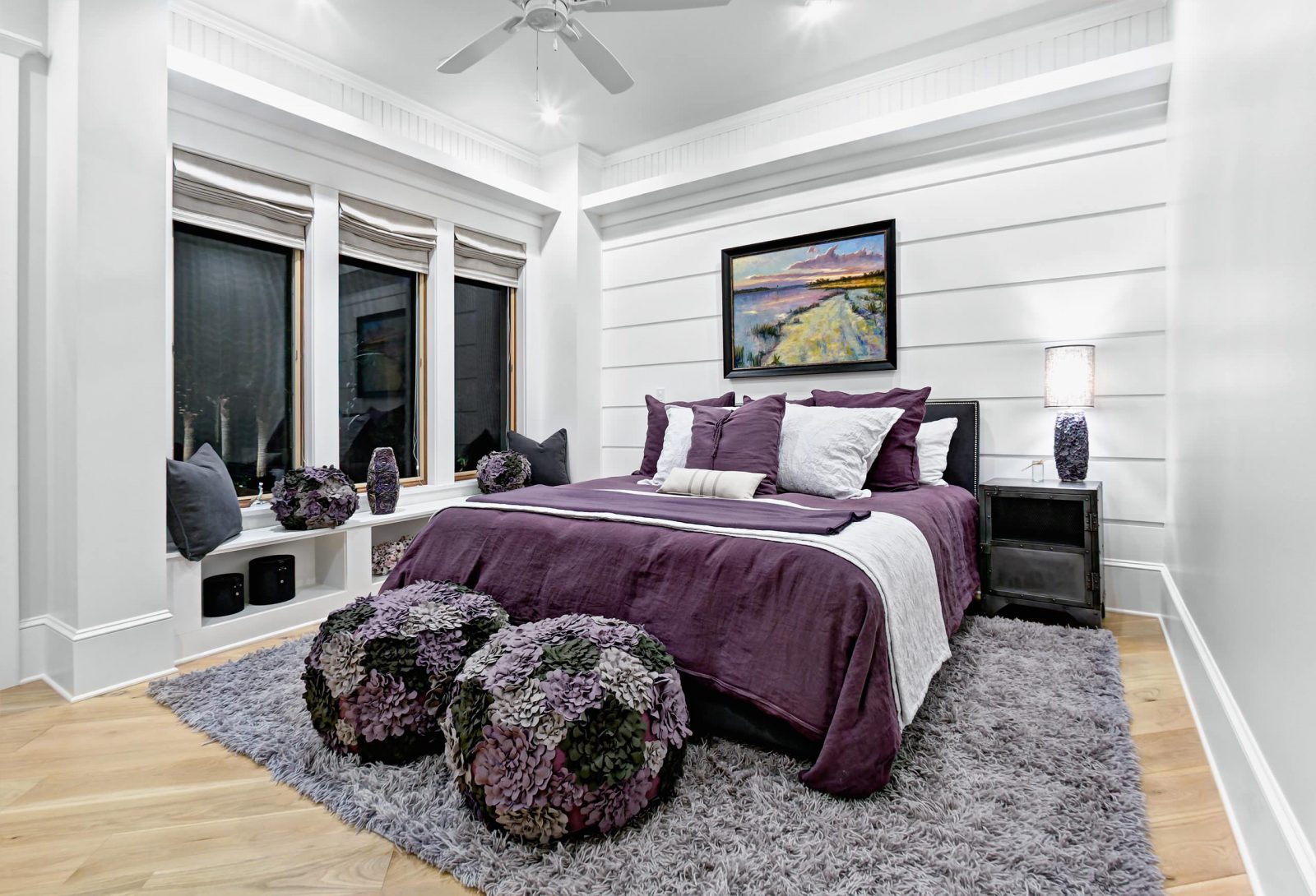Purple And Grey Beach Style Bedroom With Fluffy Rug And Ottomans 1600x1090 