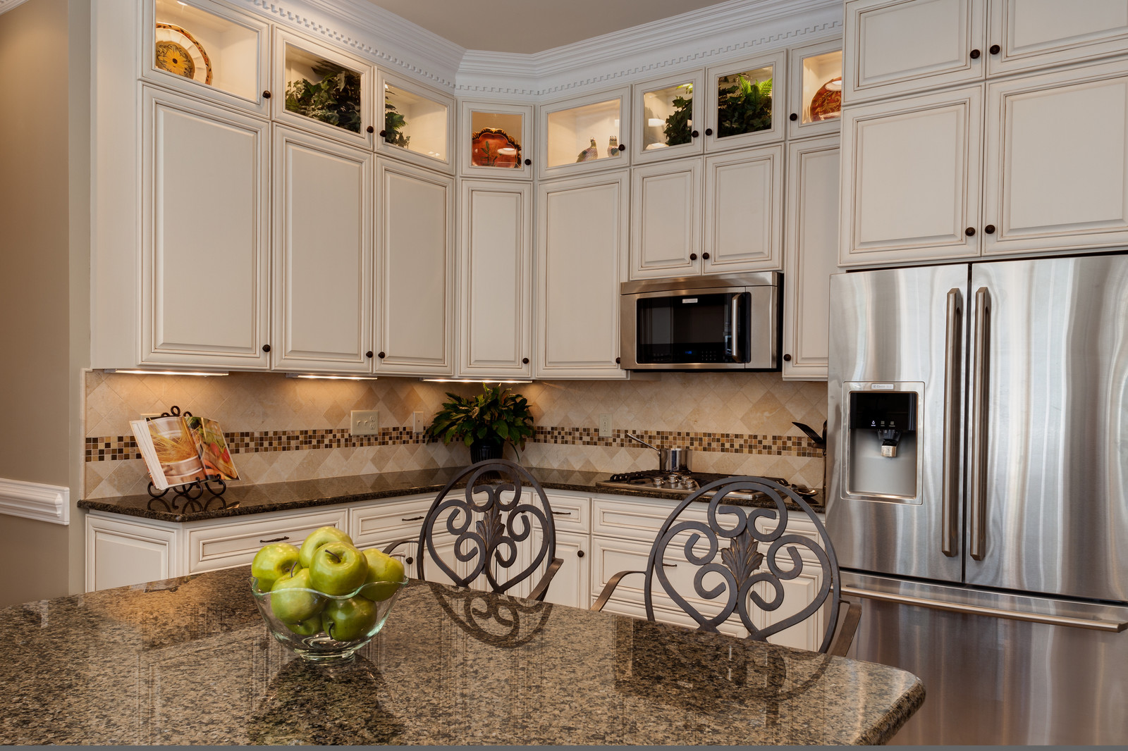 Modern White Kitchen Cabinets With Brown Granite Counters with Simple Decor